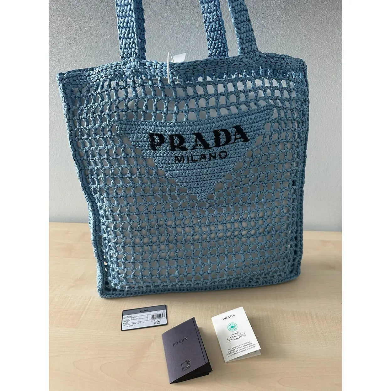Prada Raffia Bag With Woven Logo In Blue
