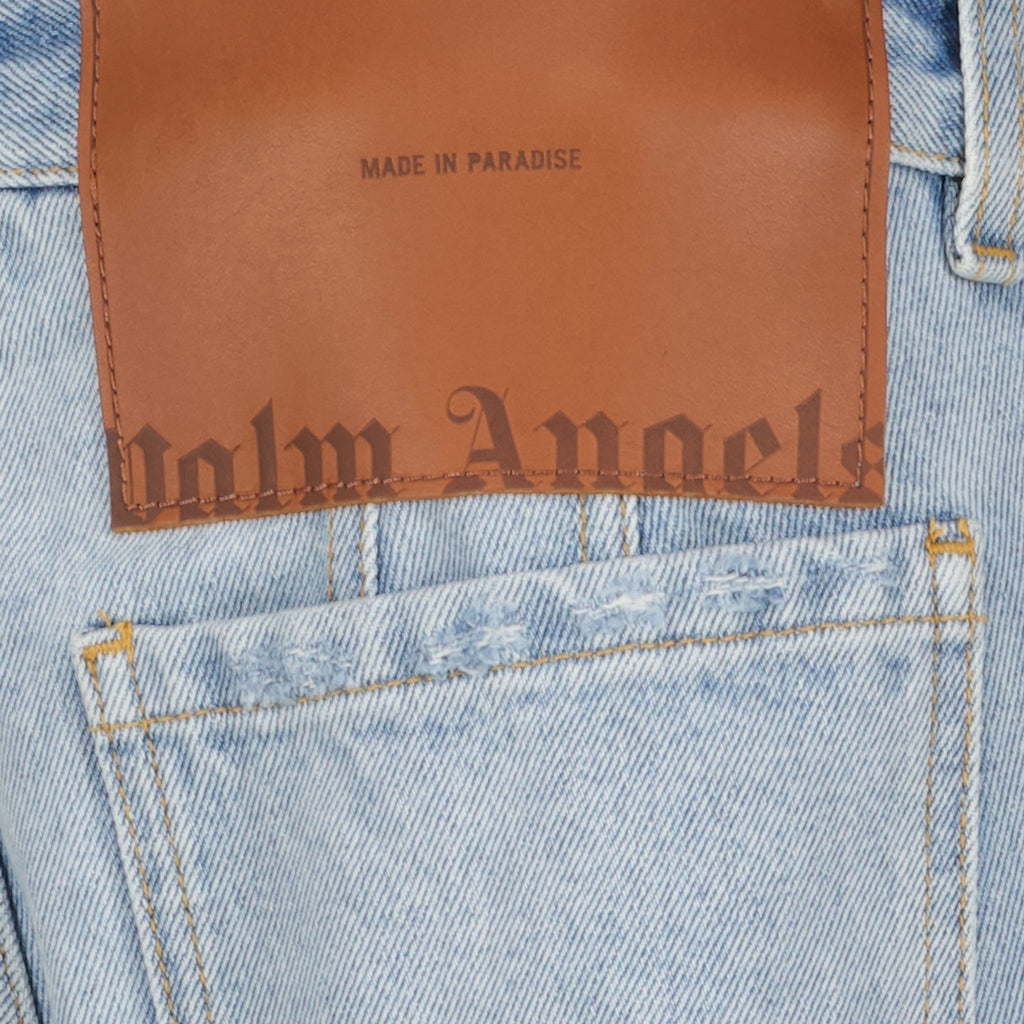 Distressed Flared Denim Jeans