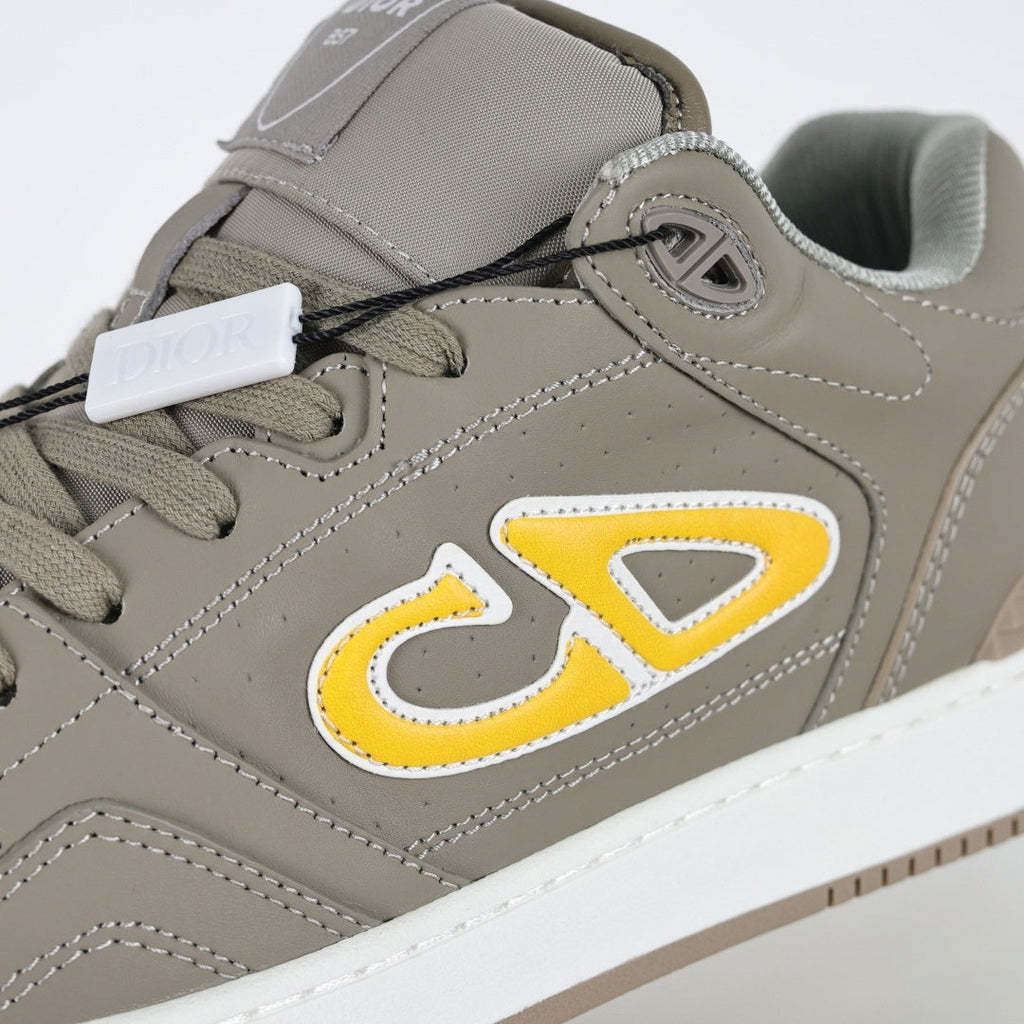 B57 Low-Top Sneakers in Taupe with Yellow CD Signature