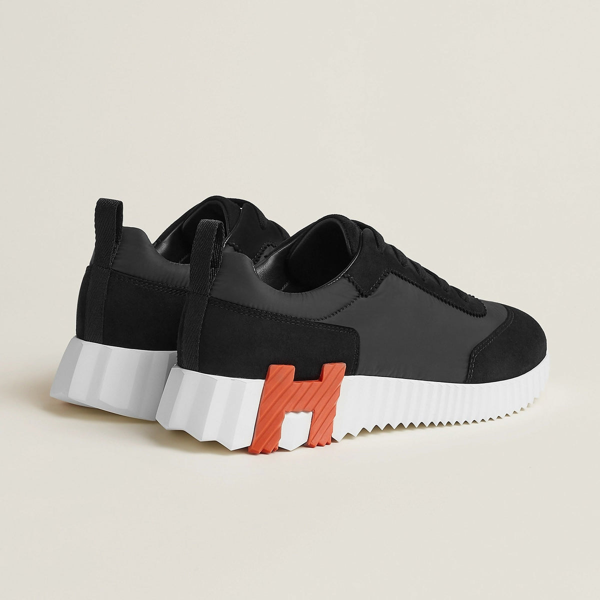 Bouncing Sneakers in Black and Orange